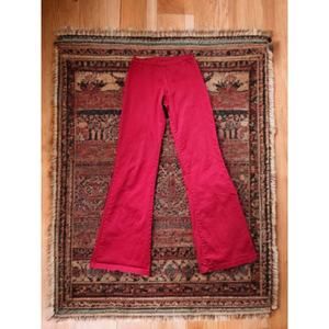 Vintage low rise cherry red bell bottom pants. Cotton blend, side zip.